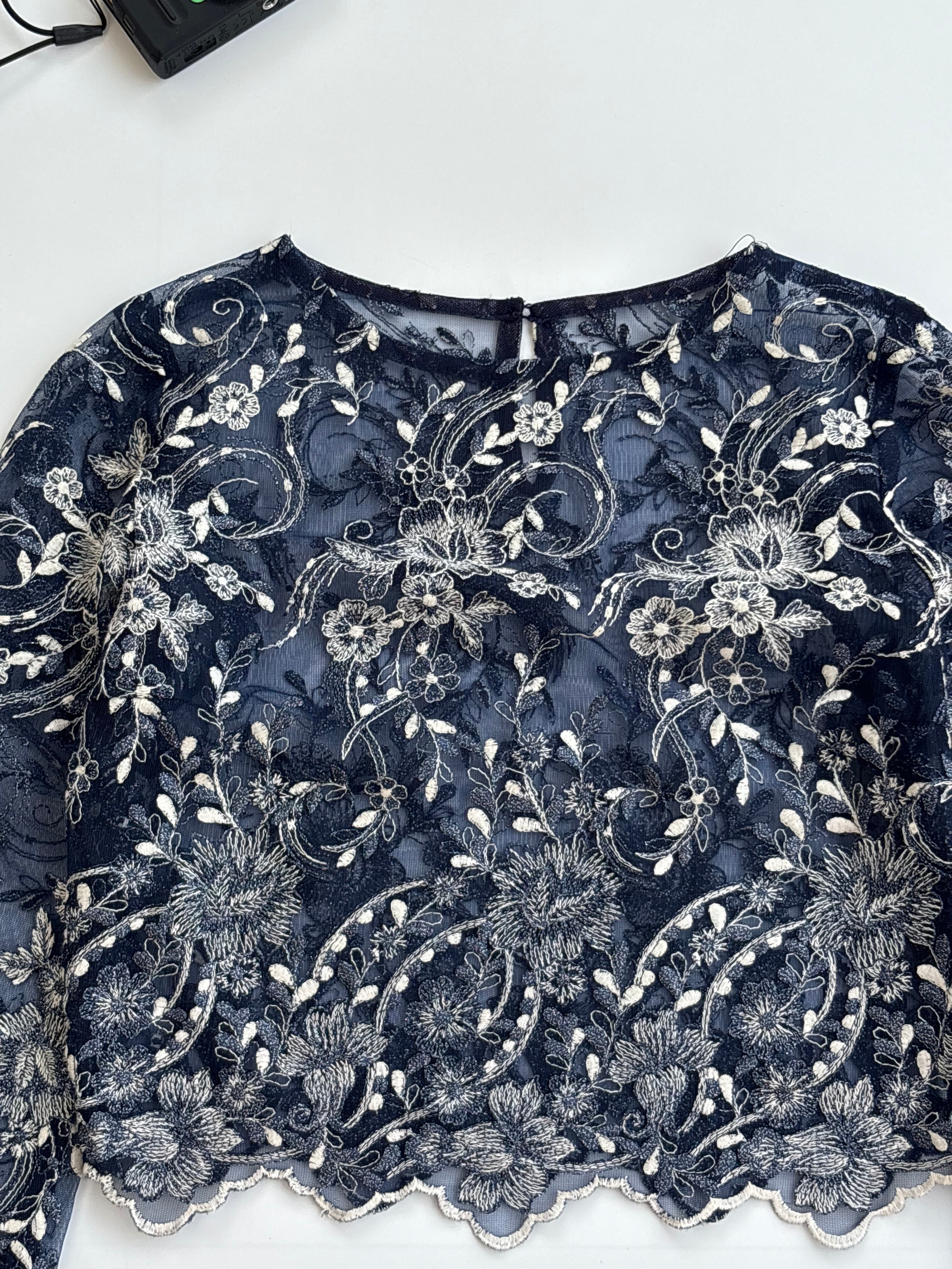 Semi transparent embroidered top