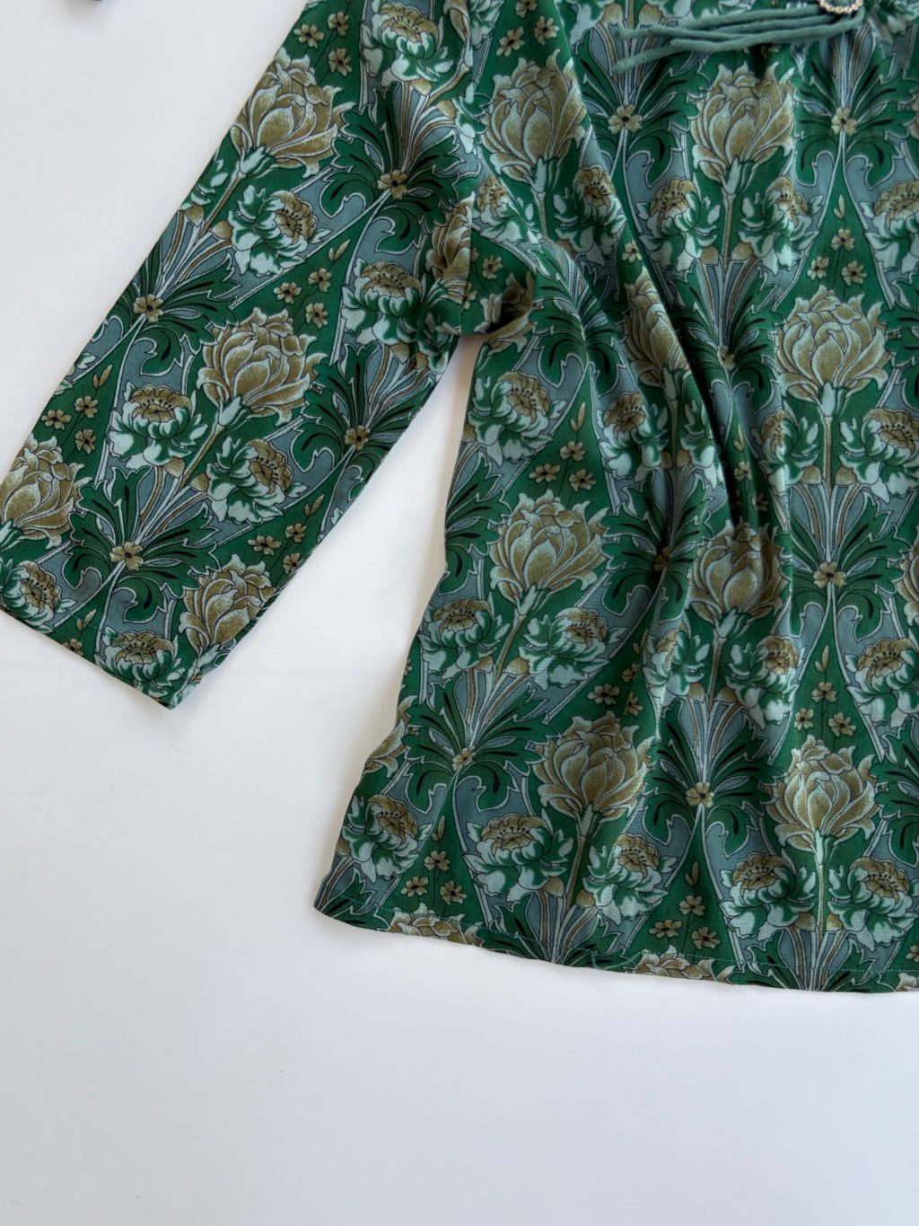 Peacock top