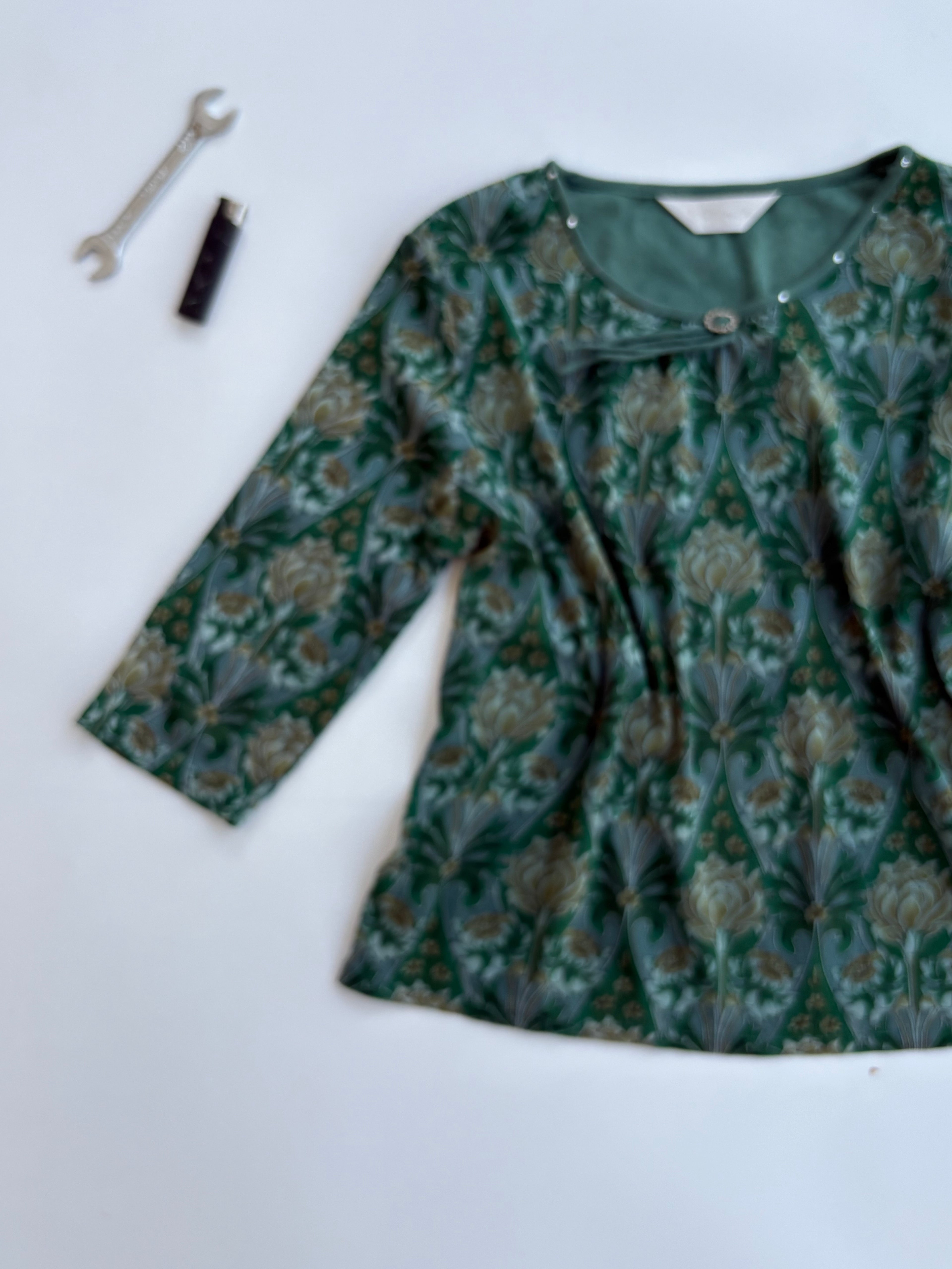 Peacock top